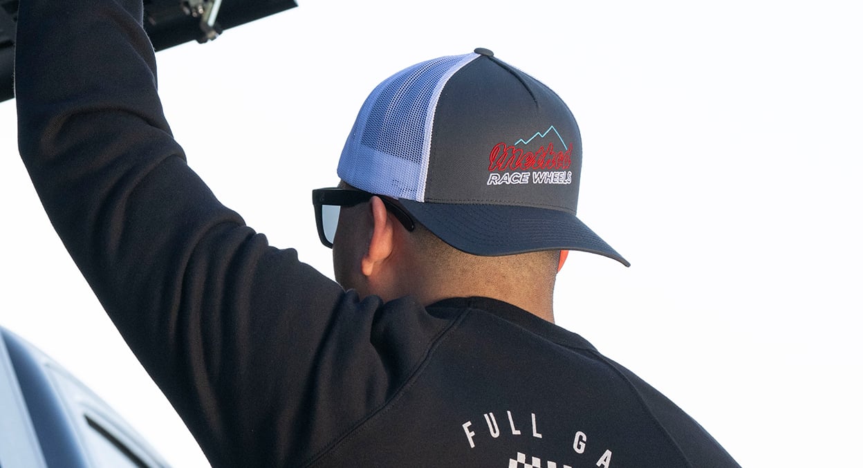 METHOD NEON MOUNTAIN CURVEBILL TRUCKER HAT SNAPBACK