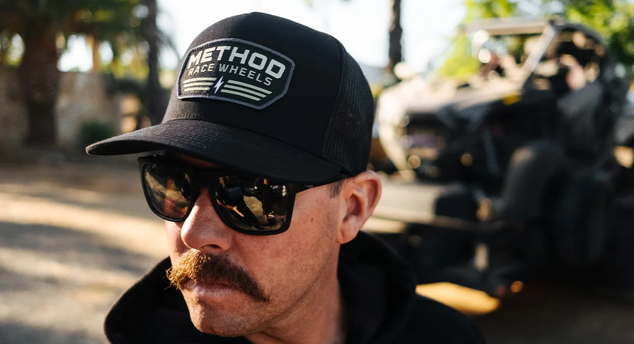 METHOD FLIGHT BADGE FLATBILL TRUCKER HAT BLACK SNAPBACK